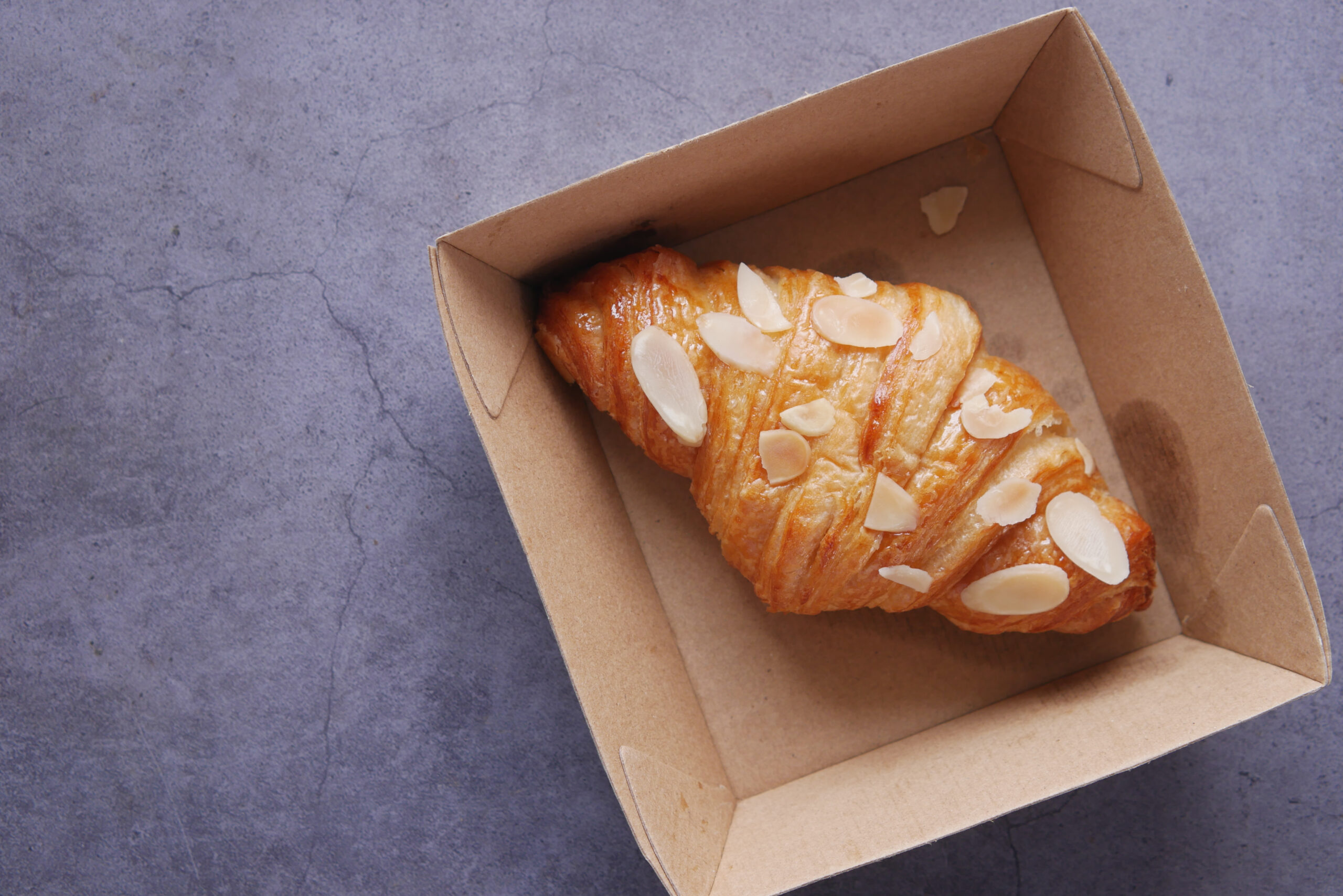 fresh baked croissant in a bow on table 2026 01 06 10 21 53 utc