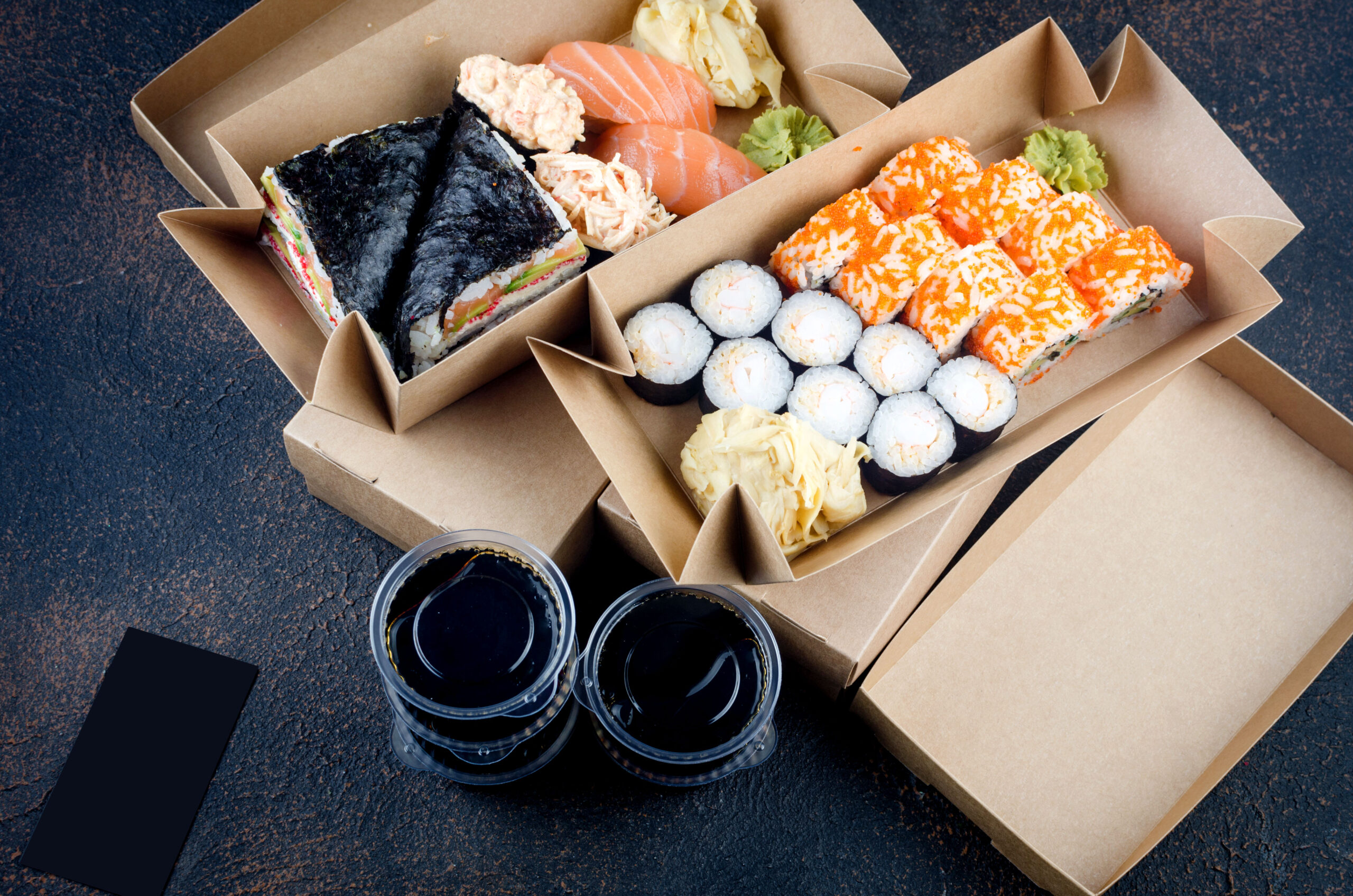 tasty sushi rolls in disposable kraft paper boxes 2026 03 23 23 51 41 utc