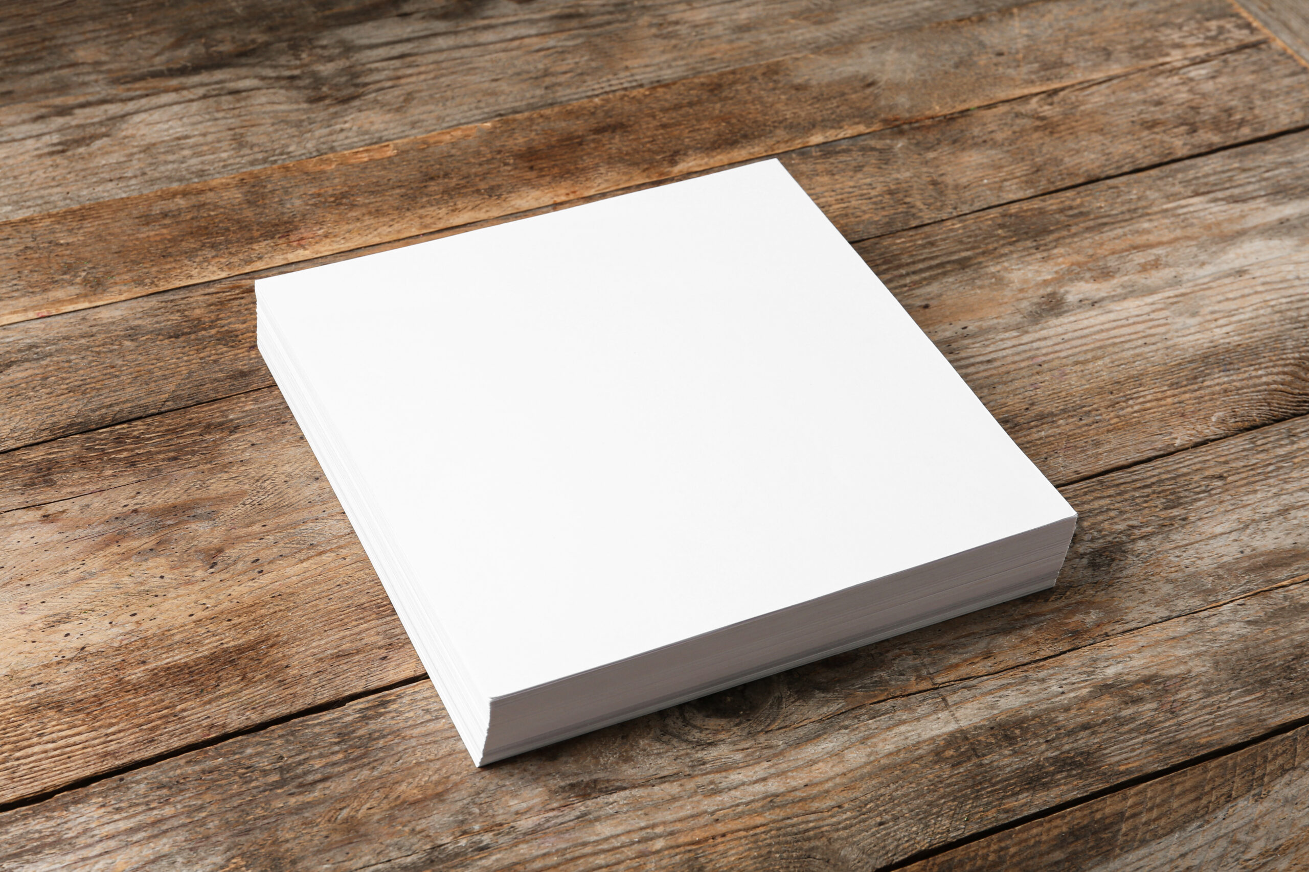 stack of blank paper sheets for brochure on wooden 2026 03 19 20 37 04 utc