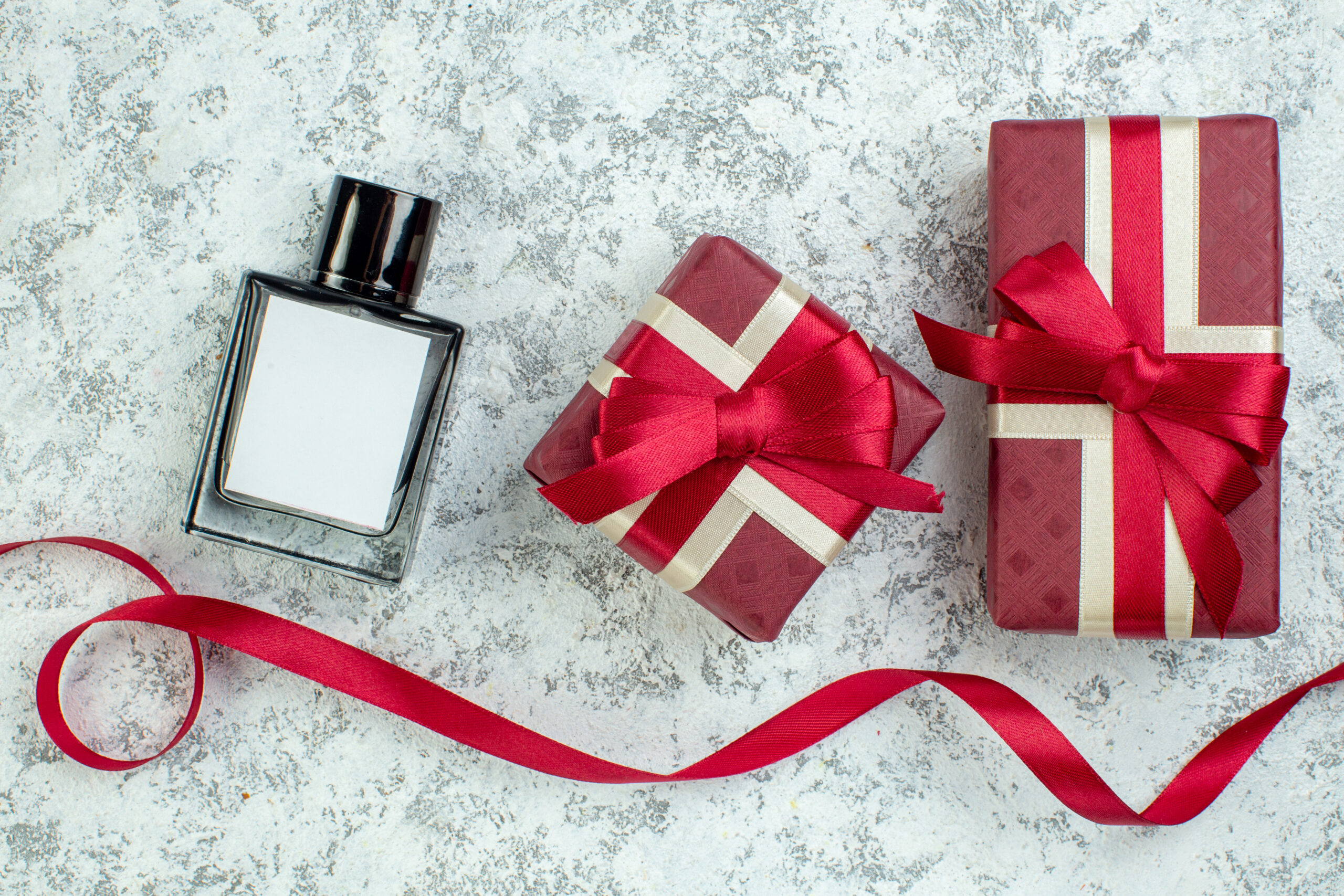 top view red giftboxes tied with red ribbon perfum 2026 03 18 13 43 45 utc