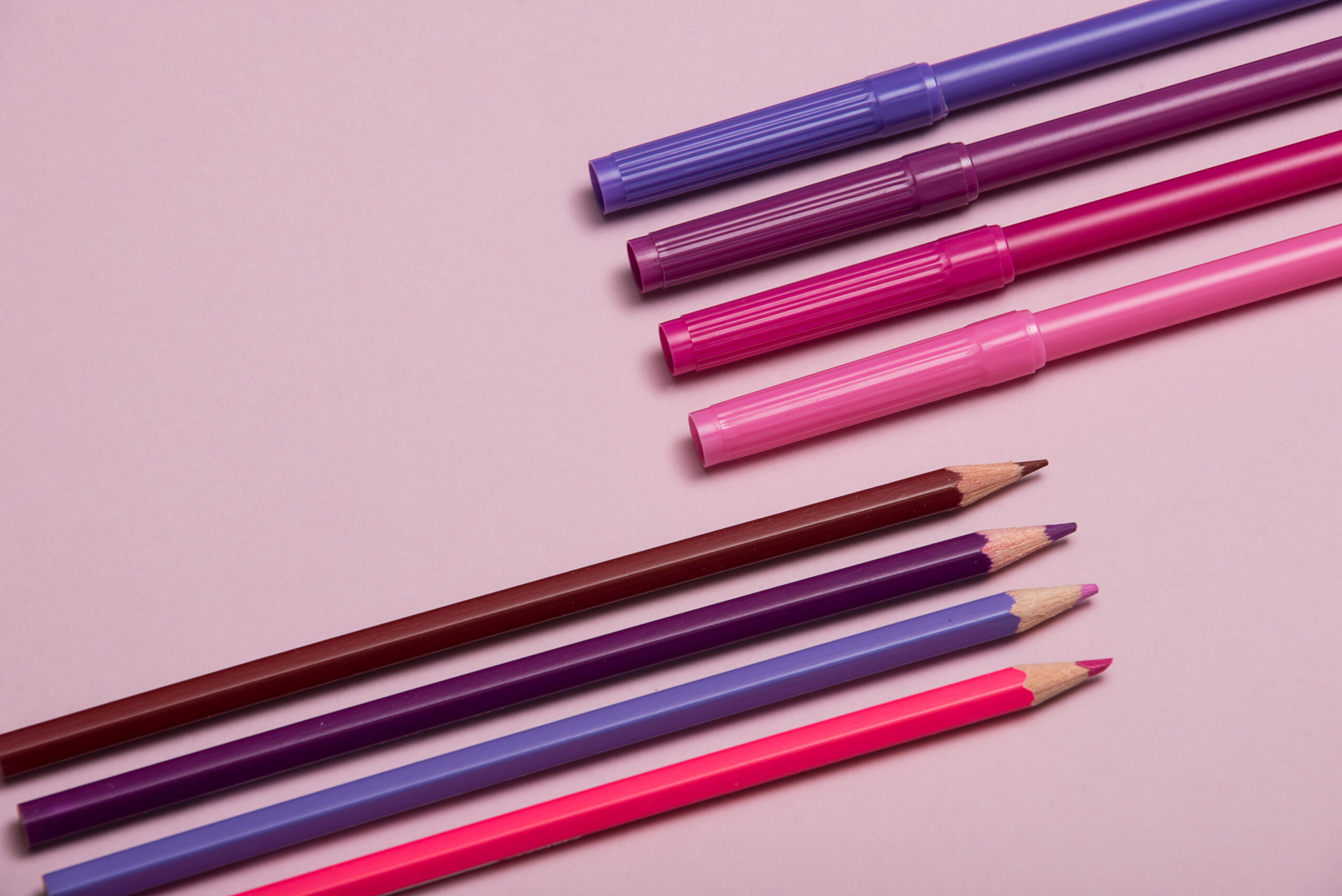 colourful pencils over a pink background 2026 03 17 08 25 17 utc