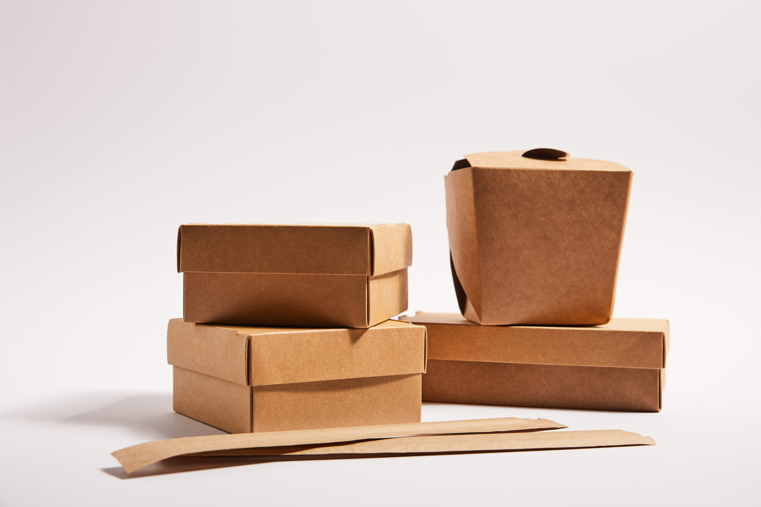 chopsticks in paper packaging near takeaway boxes 2026 03 13 01 19 47 utc
