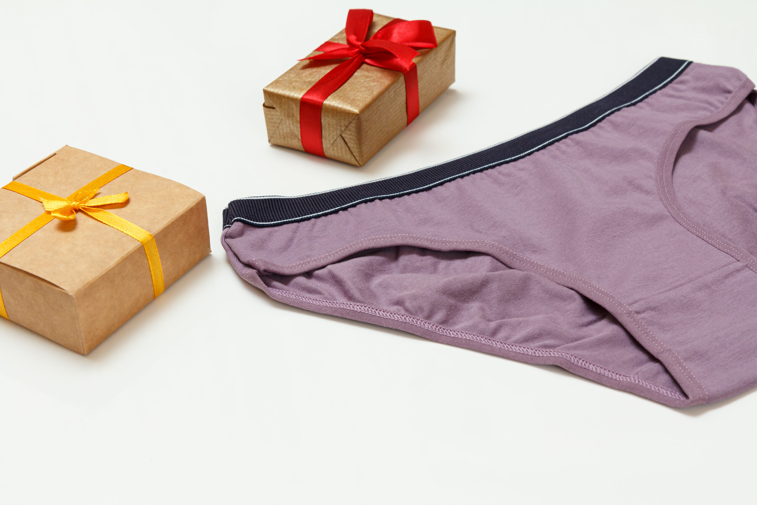 purple cotton panties and gift boxes on the white 2026 01 11 09 12 09 utc