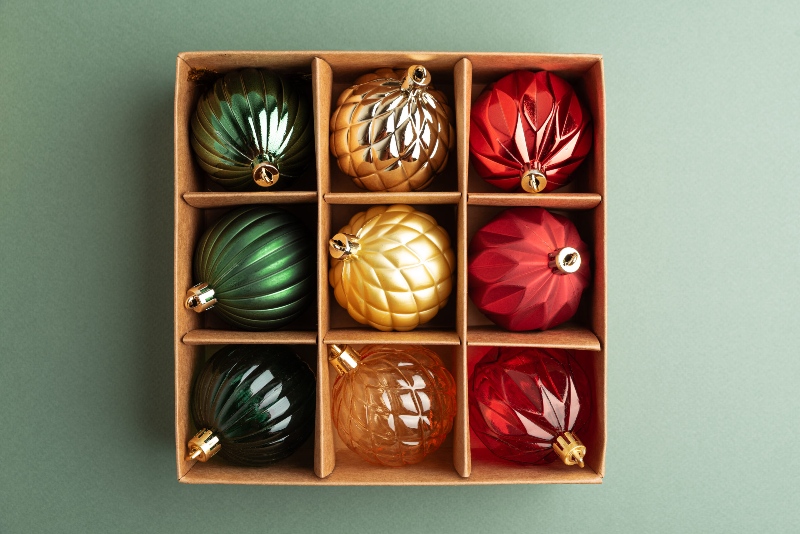 box of christmas ornaments in festive colors on gr 2026 03 26 23 12 39 utc