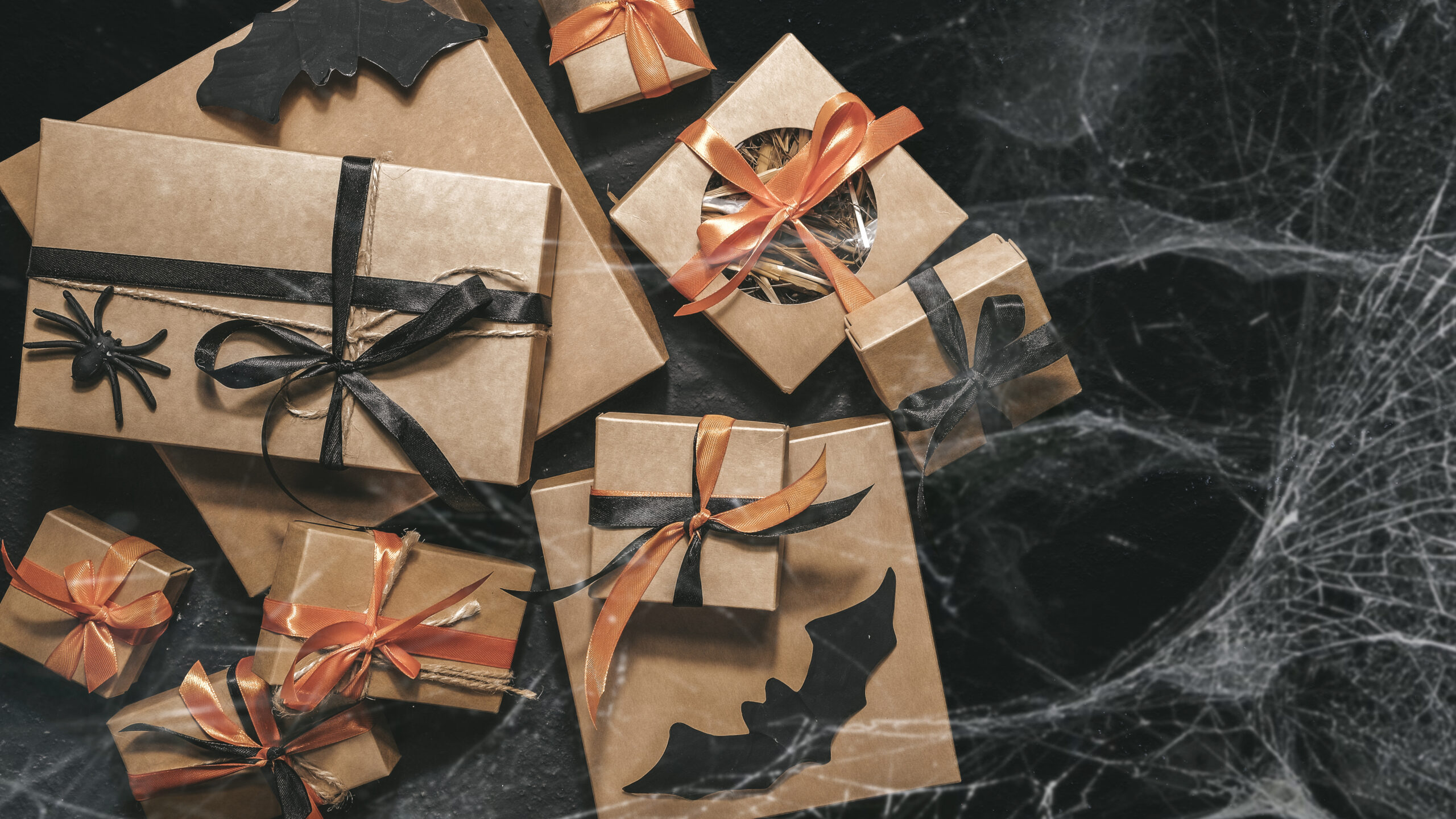 halloween holiday themed presents with spider webs 2026 03 19 23 47 00 utc