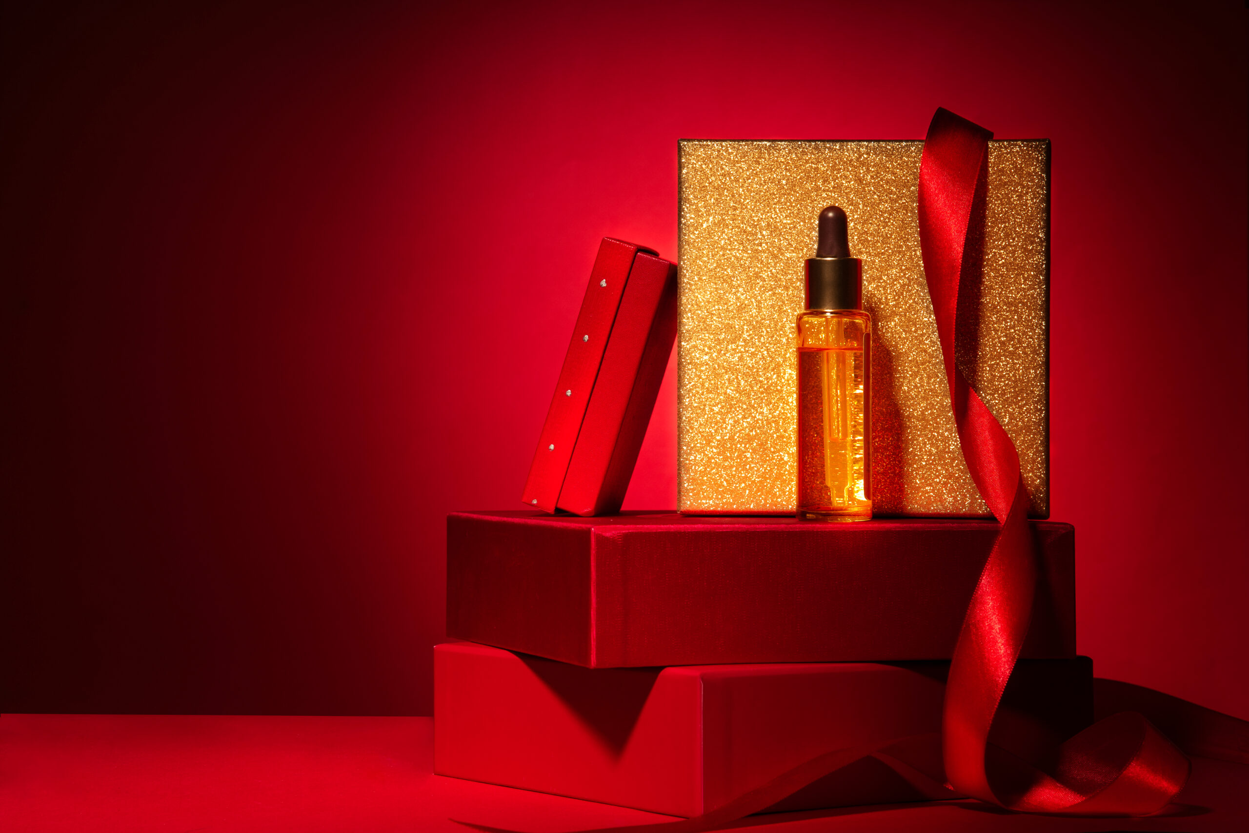 gold cosmetics on red podium with gift boxes and d 2026 03 19 23 09 39 utc