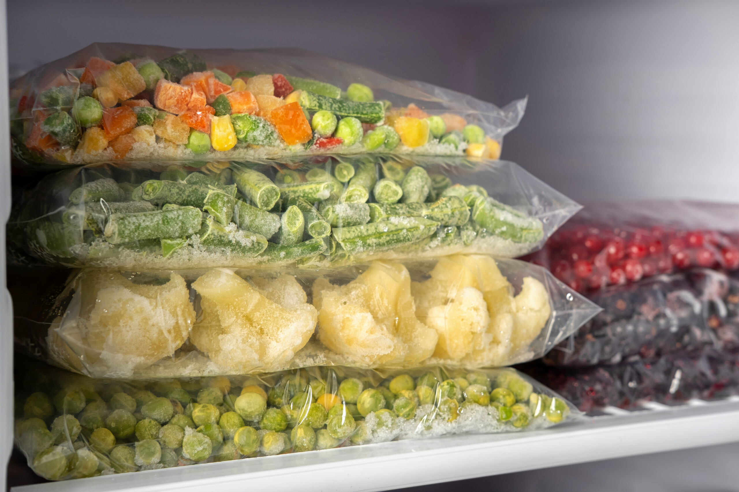 plastic bags with different frozen vegetables and 2026 03 26 10 23 14 utc
