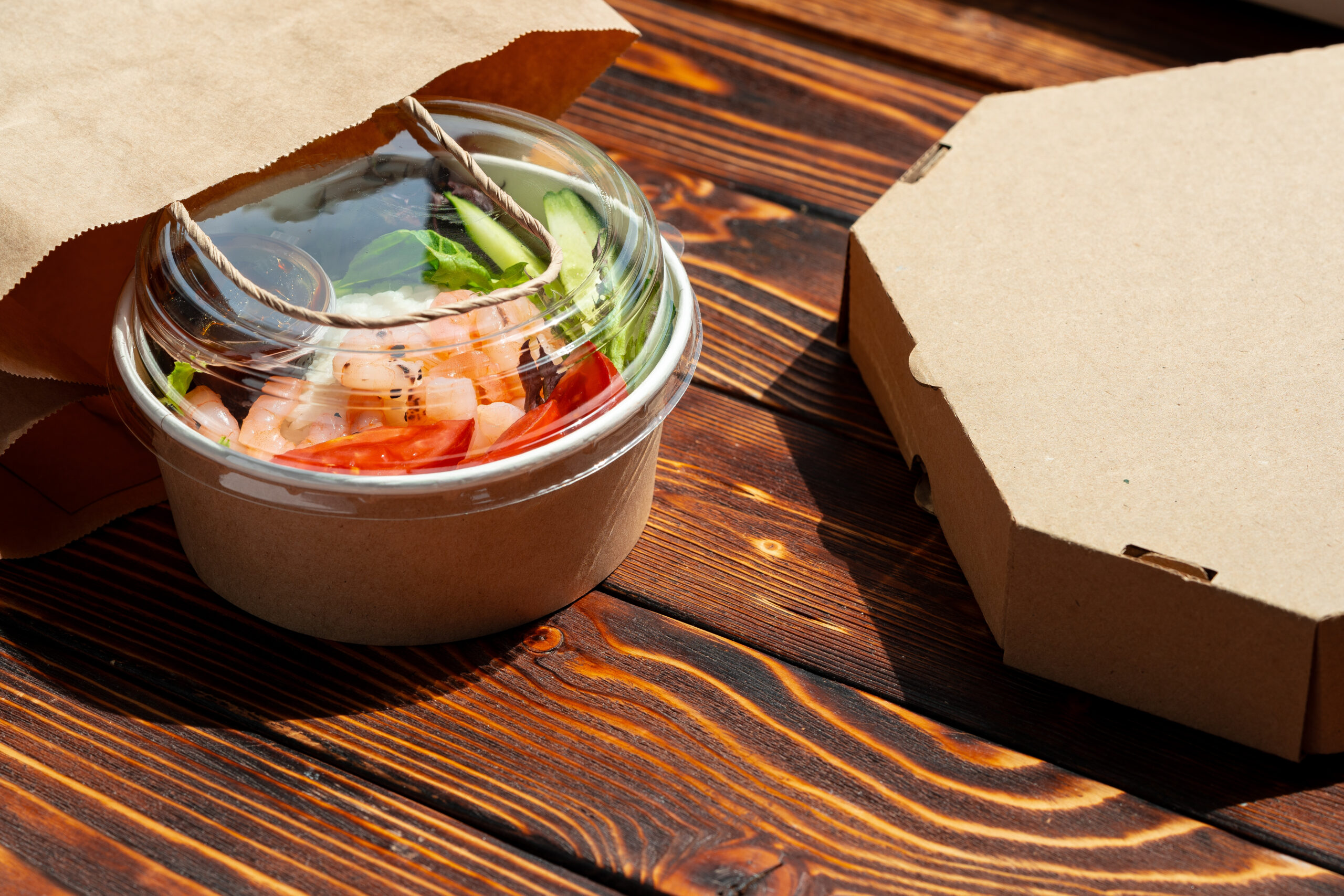 take out poke bowl on wooden background 2026 03 19 08 14 28 utc (1)