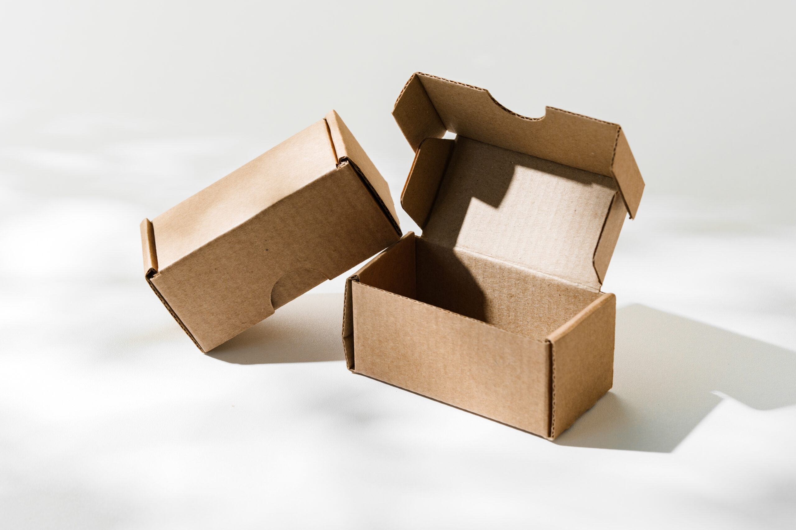 open cardboard box on a reflective surface with so 2026 03 23 23 48 22 utc
