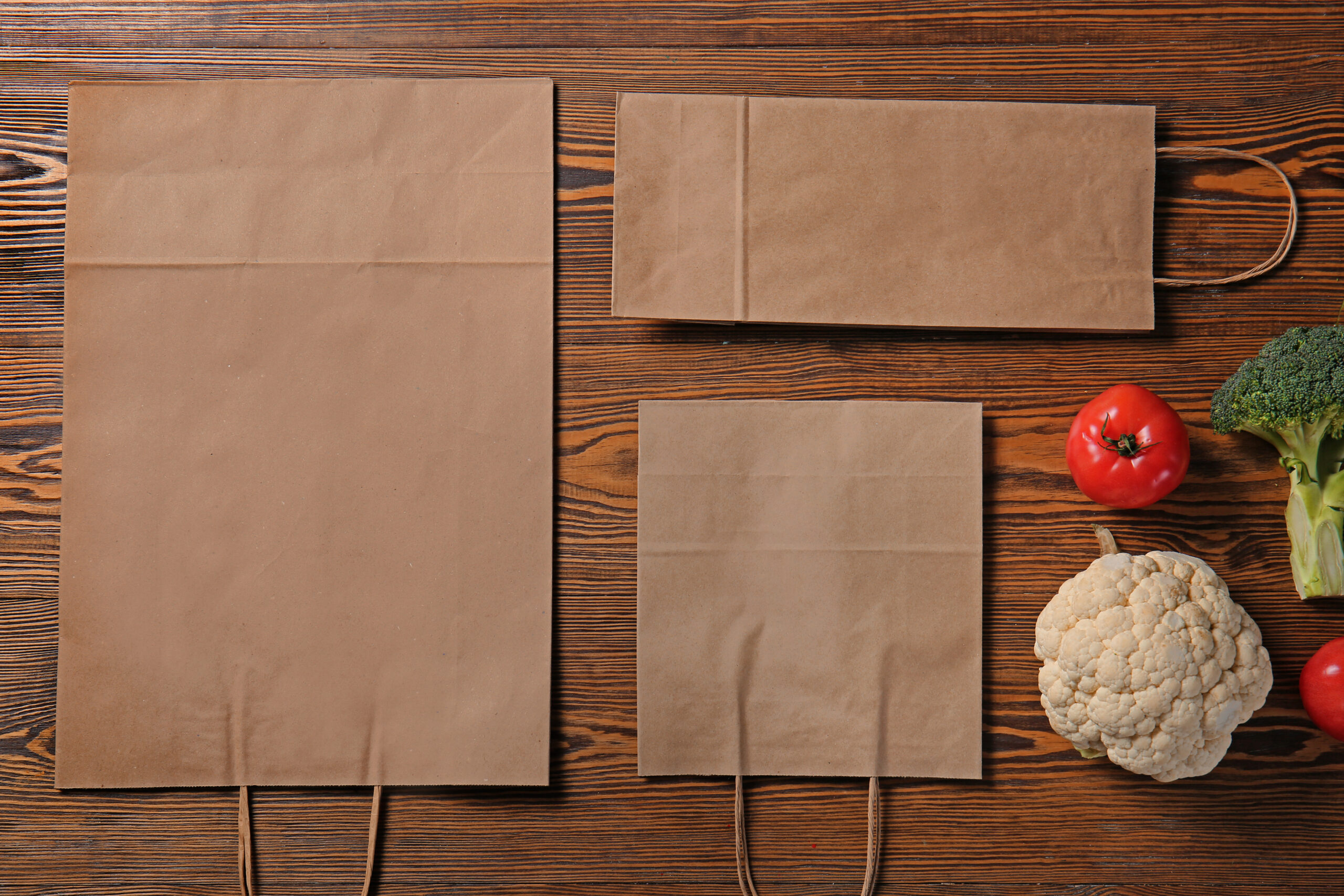 paper eco bags with fresh vegetables on wooden bac 2026 01 11 09 31 58 utc