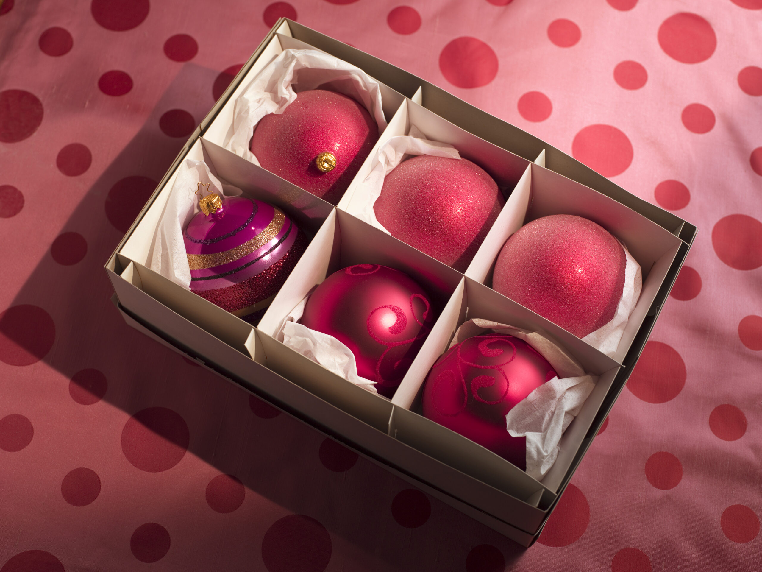 shiny red christmas ornaments in a box 2026 03 26 03 48 08 utc