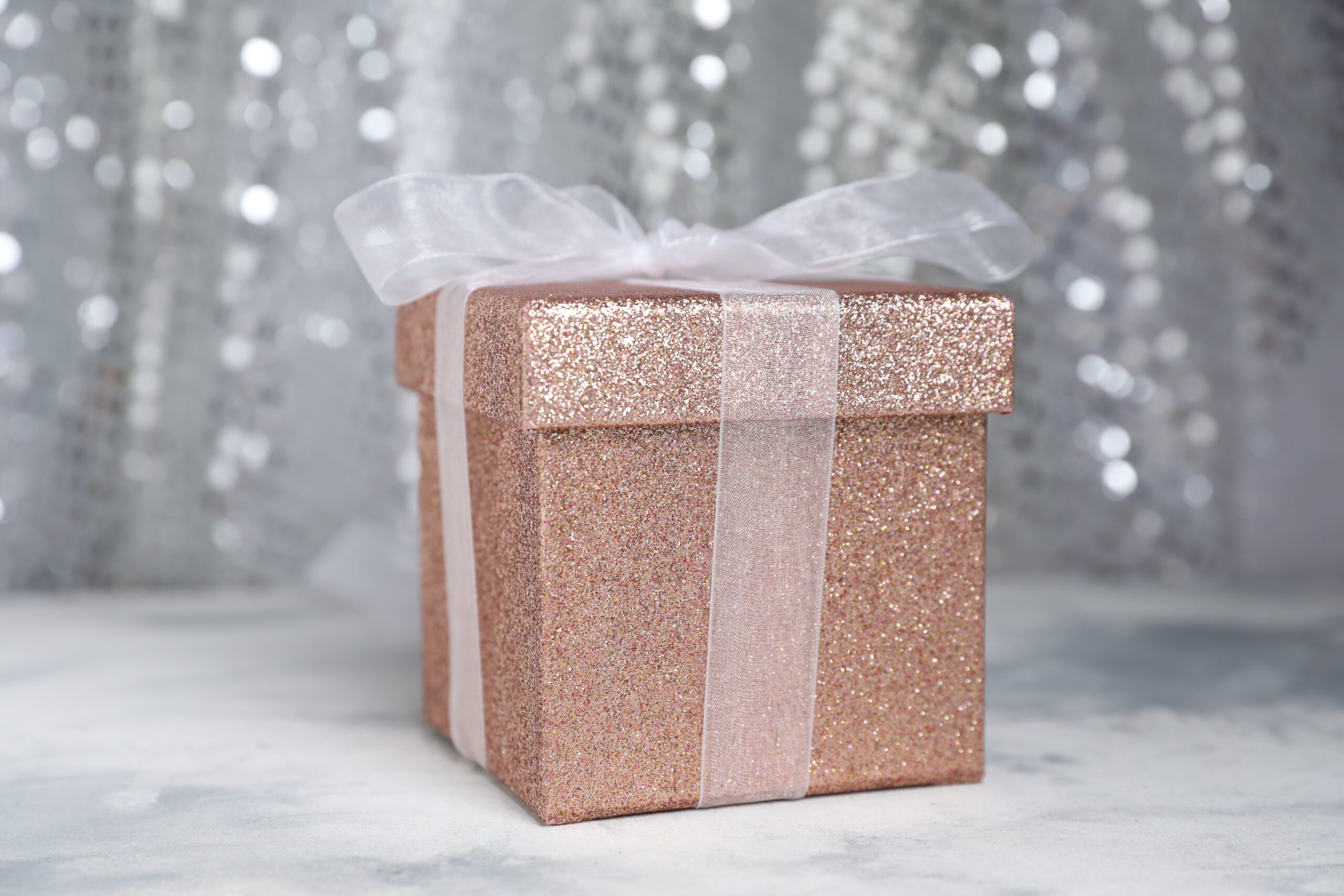 romantic gift on table against silver glitter back 2026 03 26 23 47 46 utc