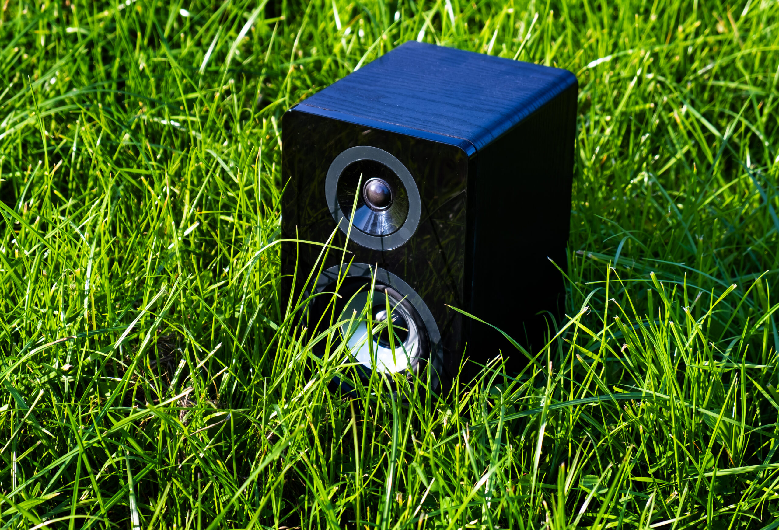loud speaker box on the grass background 2026 03 26 01 11 55 utc