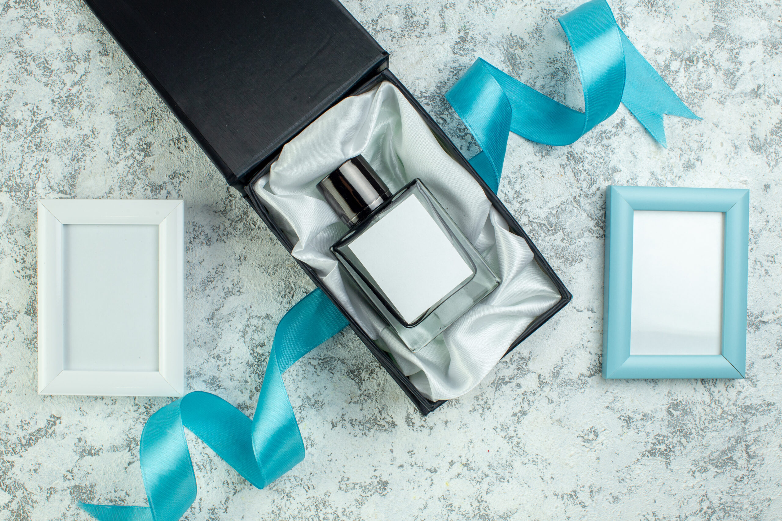 top view perfume bottle in perfume box blue and wh 2026 03 18 12 13 21 utc