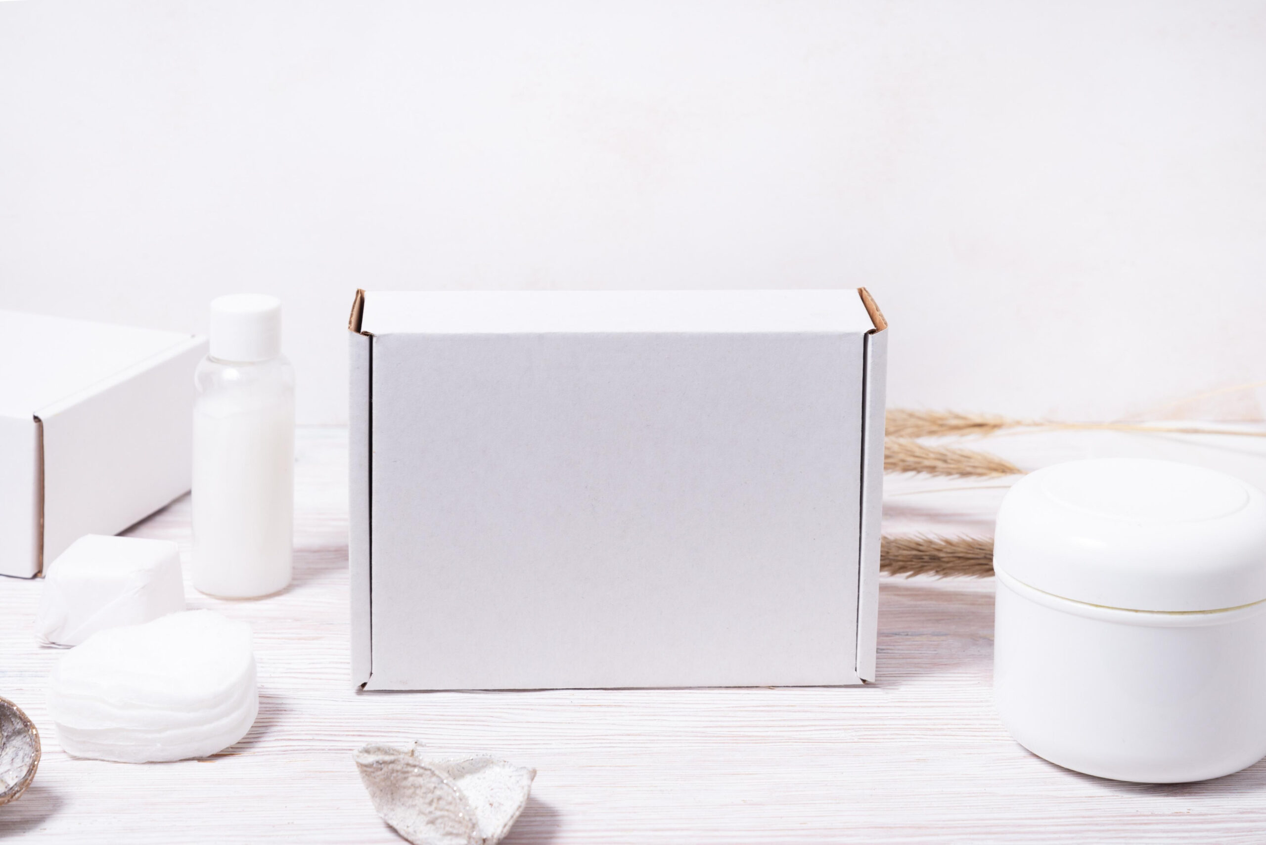 assortment of white cosmetic containers on wooden 2026 03 24 07 45 53 utc (1)