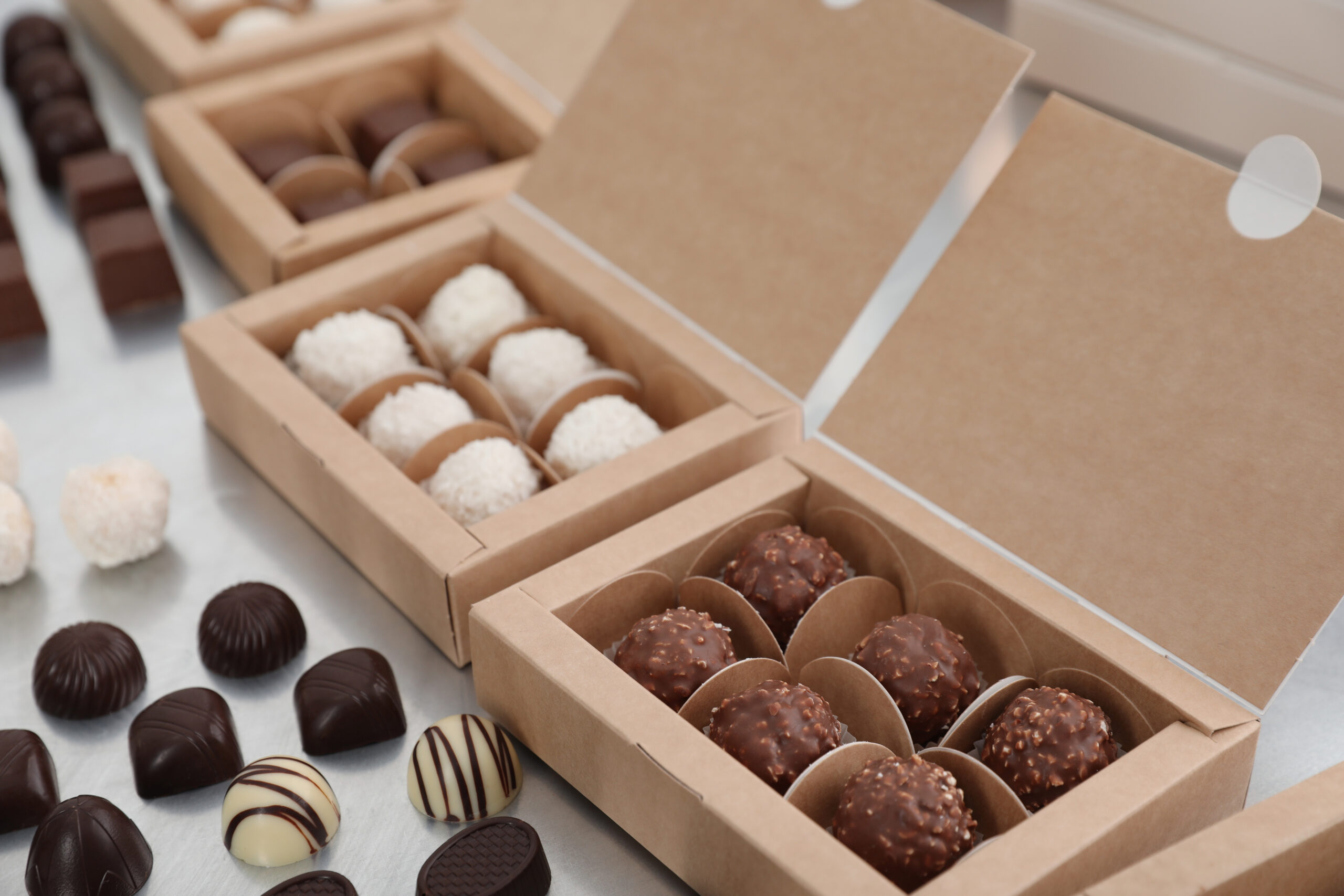 different delicious chocolate candies and boxes on 2026 01 12 16 49 37 utc