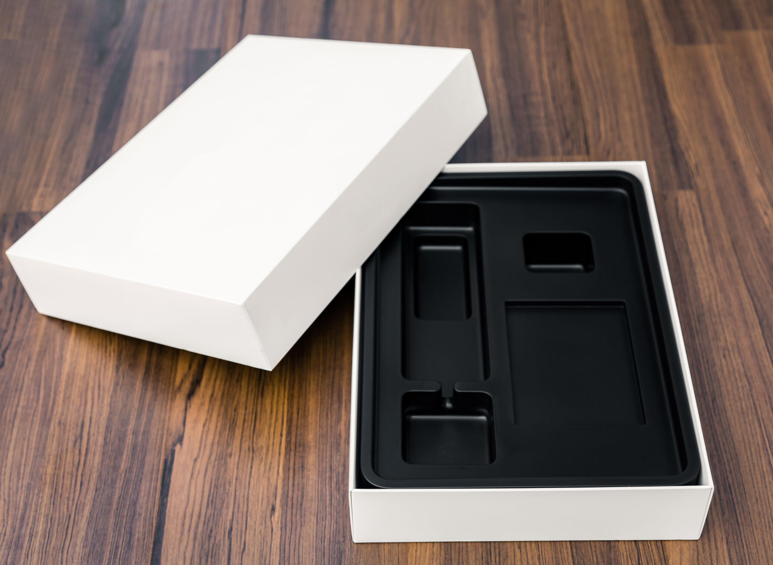 Custom rigid box with foam inserts for product protection and premium packaging