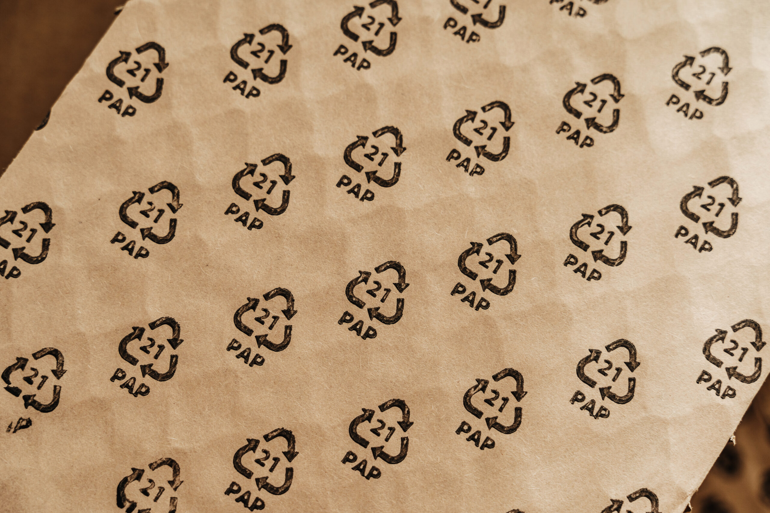 closeup shot of cardboard waste with pap 21 symbol 2026 01 05 05 14 49 utc