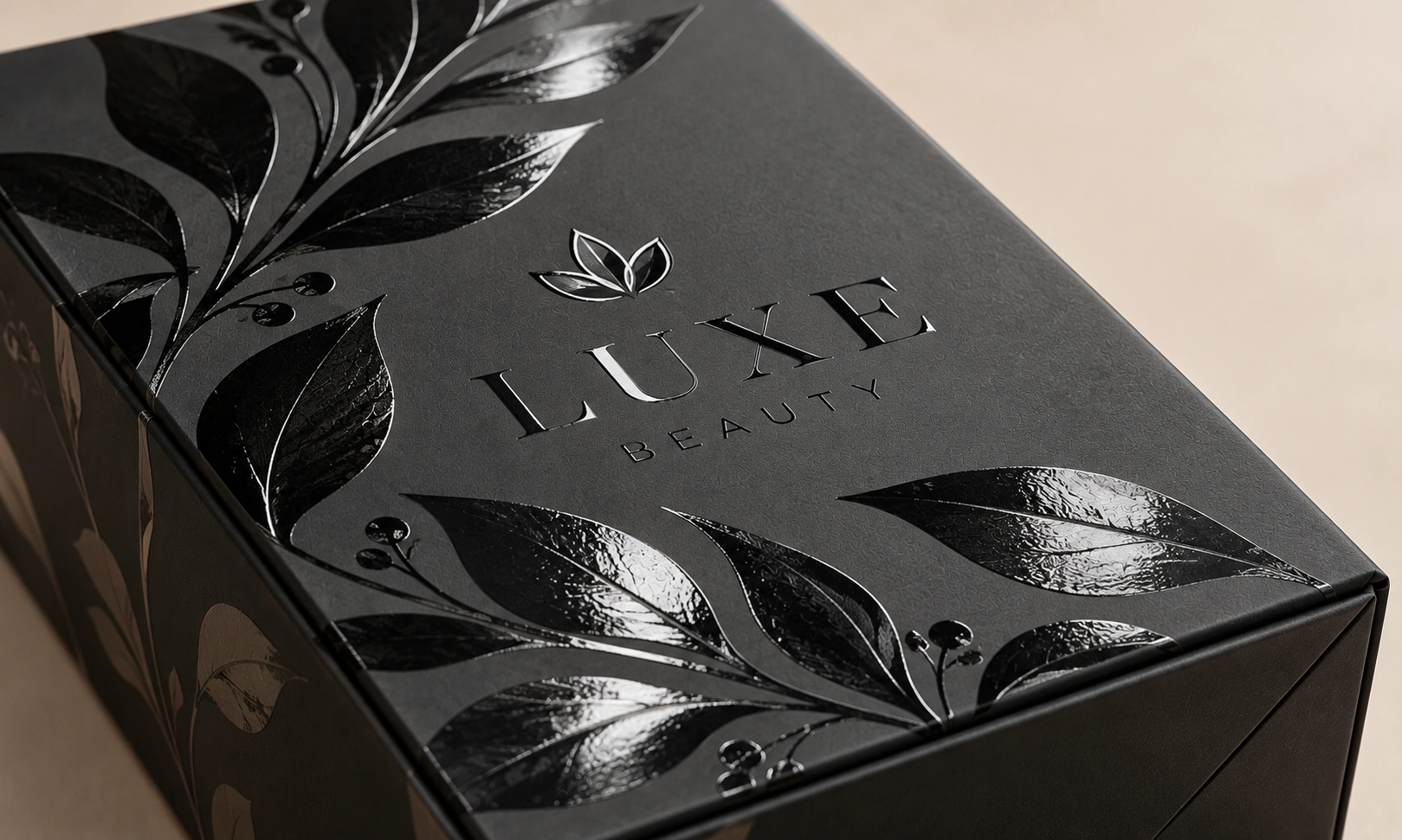 High-gloss spot UV gloss coating on matte black Luxe Beauty box by Artsy Packaging UK