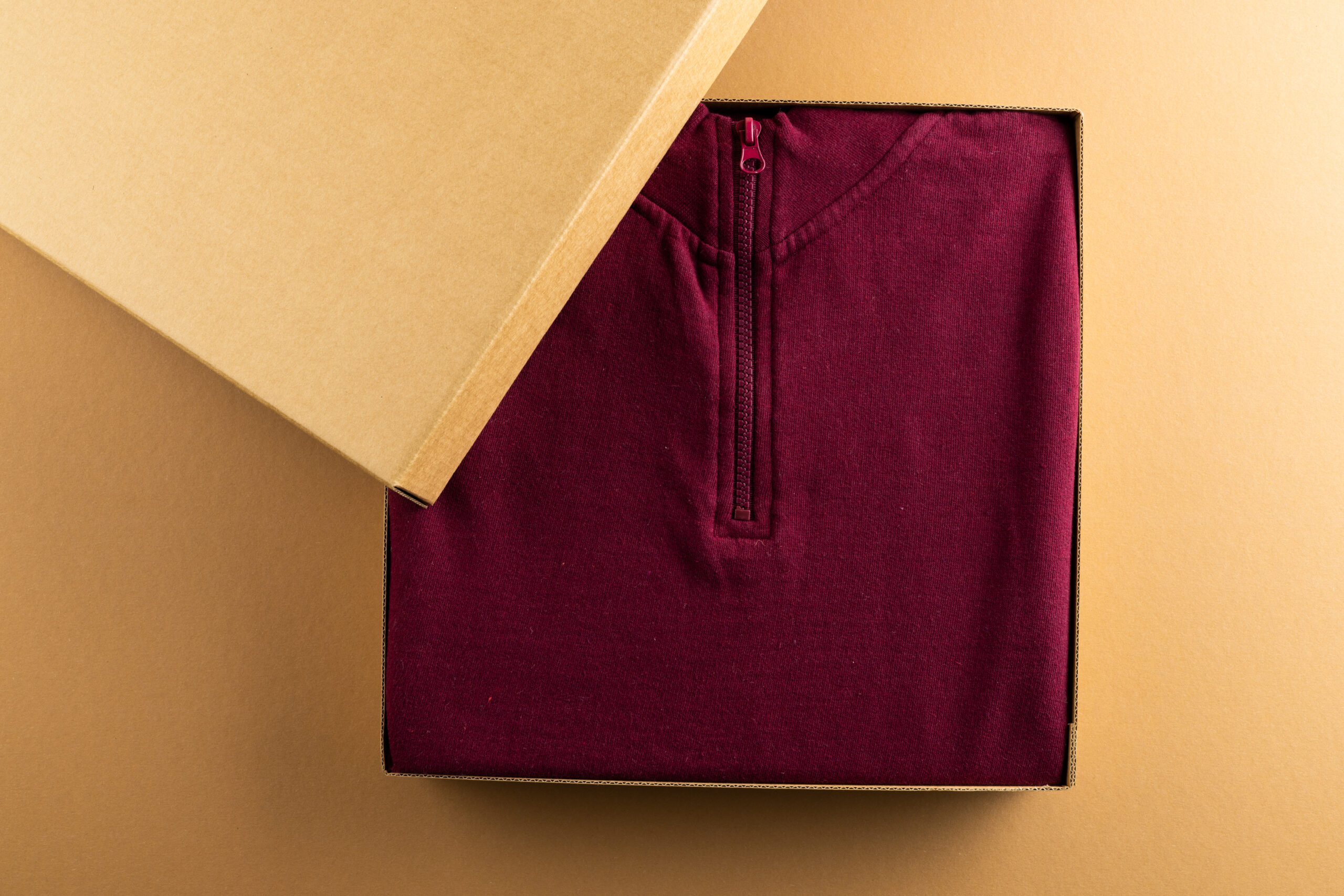 close up of red sweatshirt in packaging and copy s 2026 01 09 08 31 54 utc