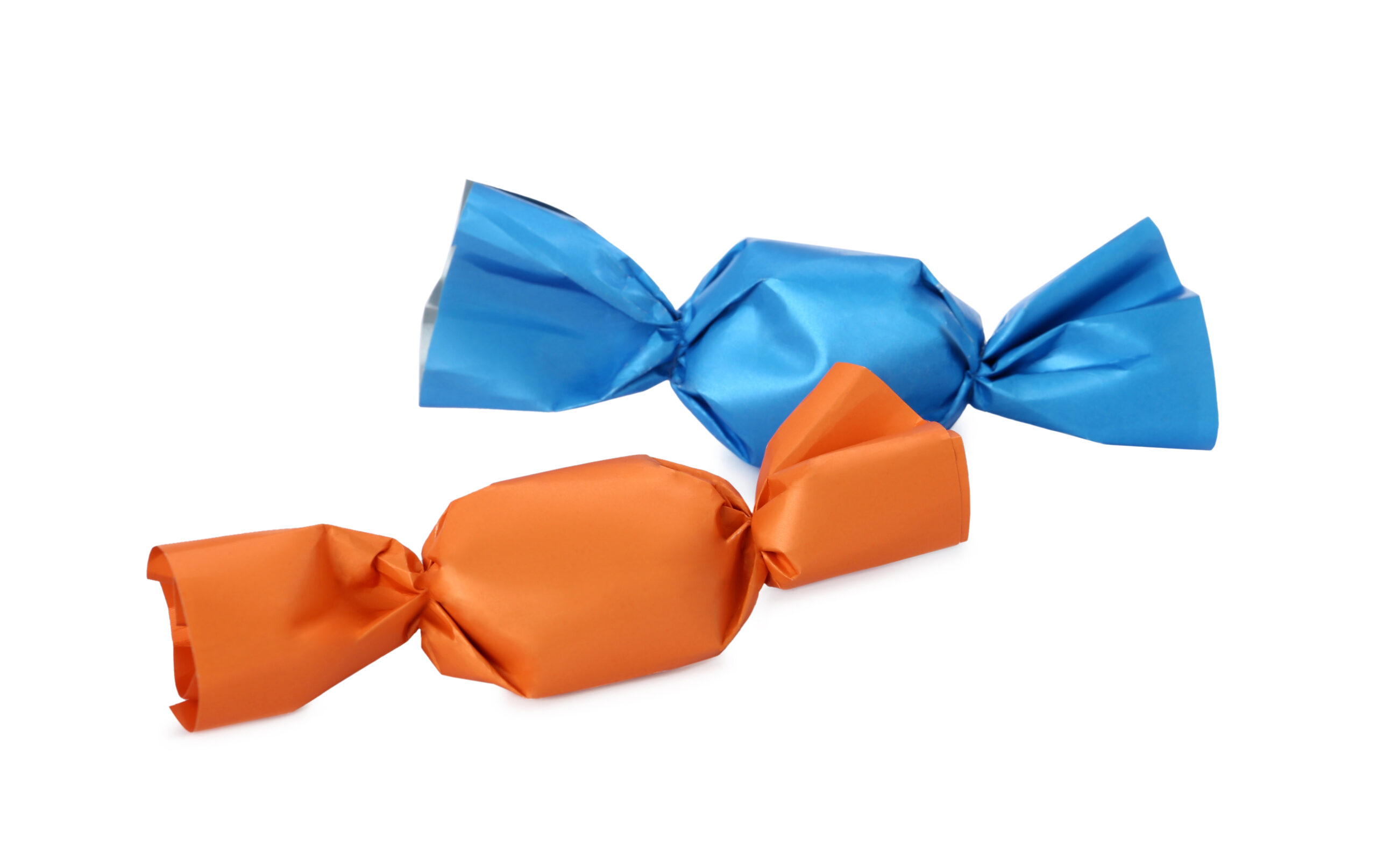 delicious candies in colorful wrappers on white ba 2026 02 19 19 43 19 utc