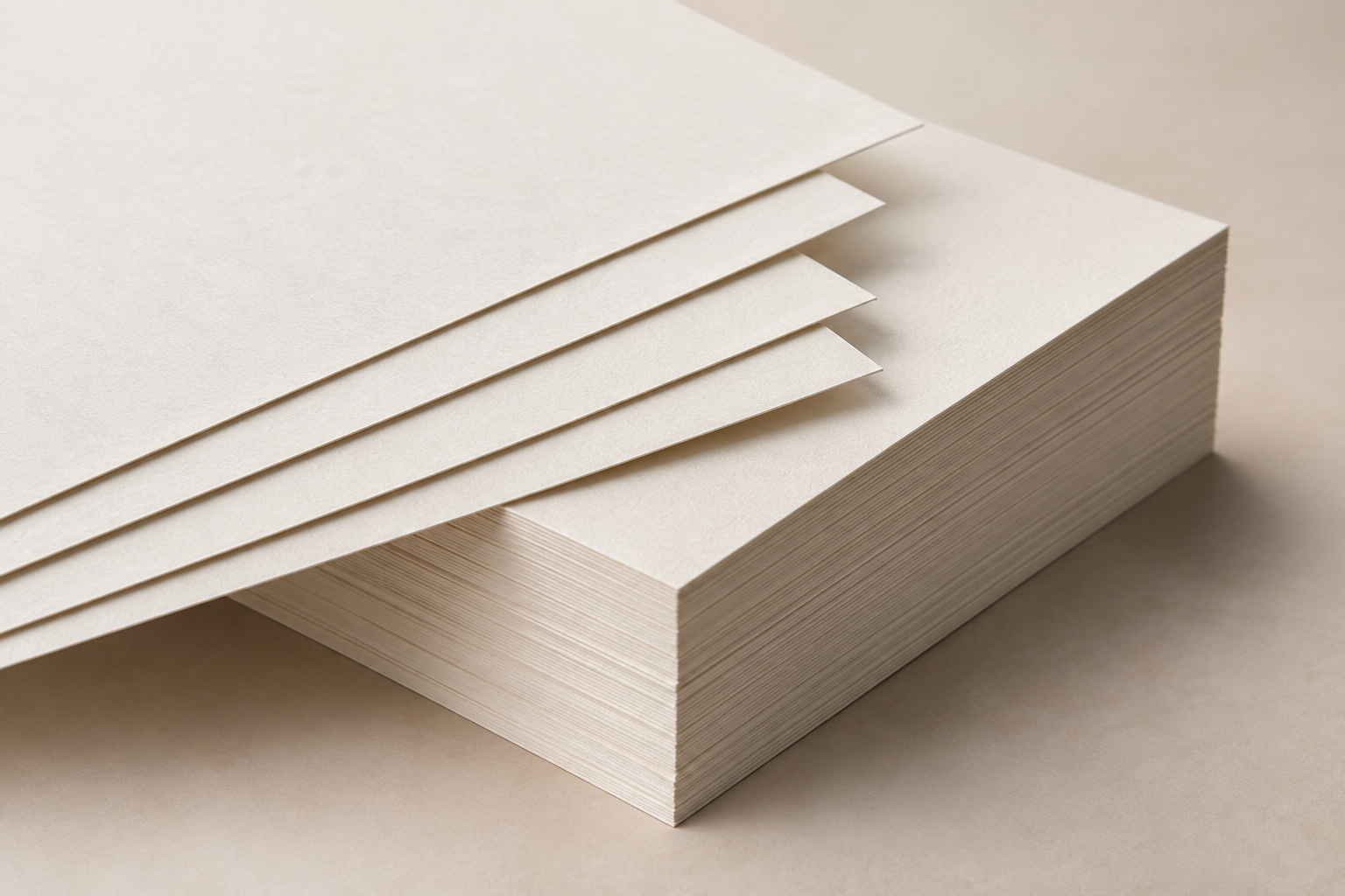 Lightweight premium cardstock paper material stack for custom tuck boxes and stationery by Artsy Packaging UK