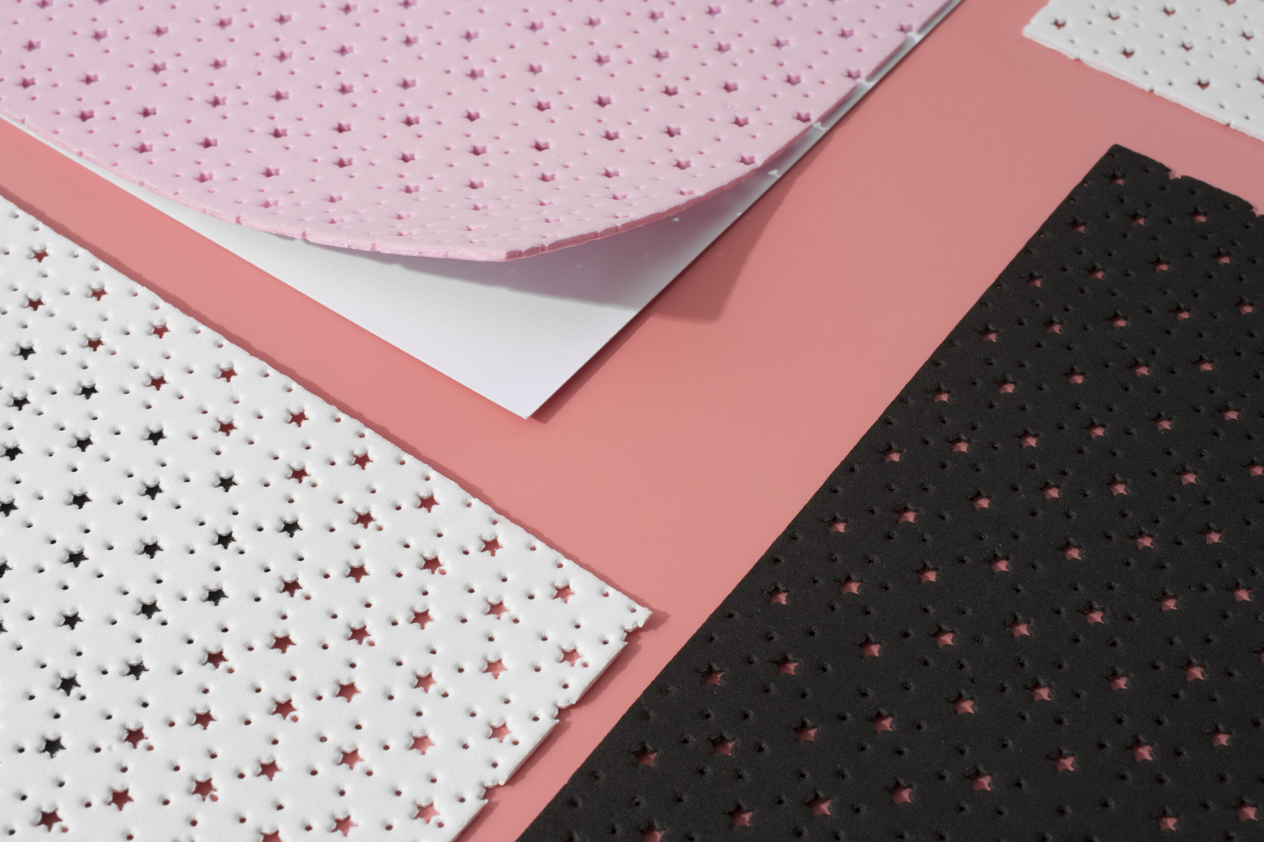 Matte and gloss lamination material samples for custom pouch packaging by Artsy Packaging UK
