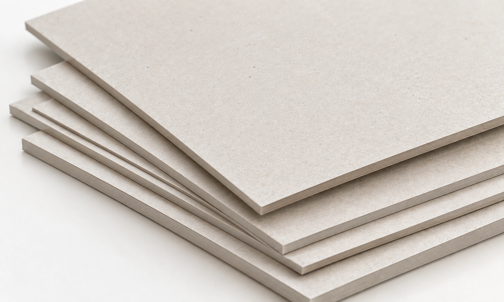Smooth white coated paperboard stock sheets for high-definition retail box printing by Artsy Packaging UK