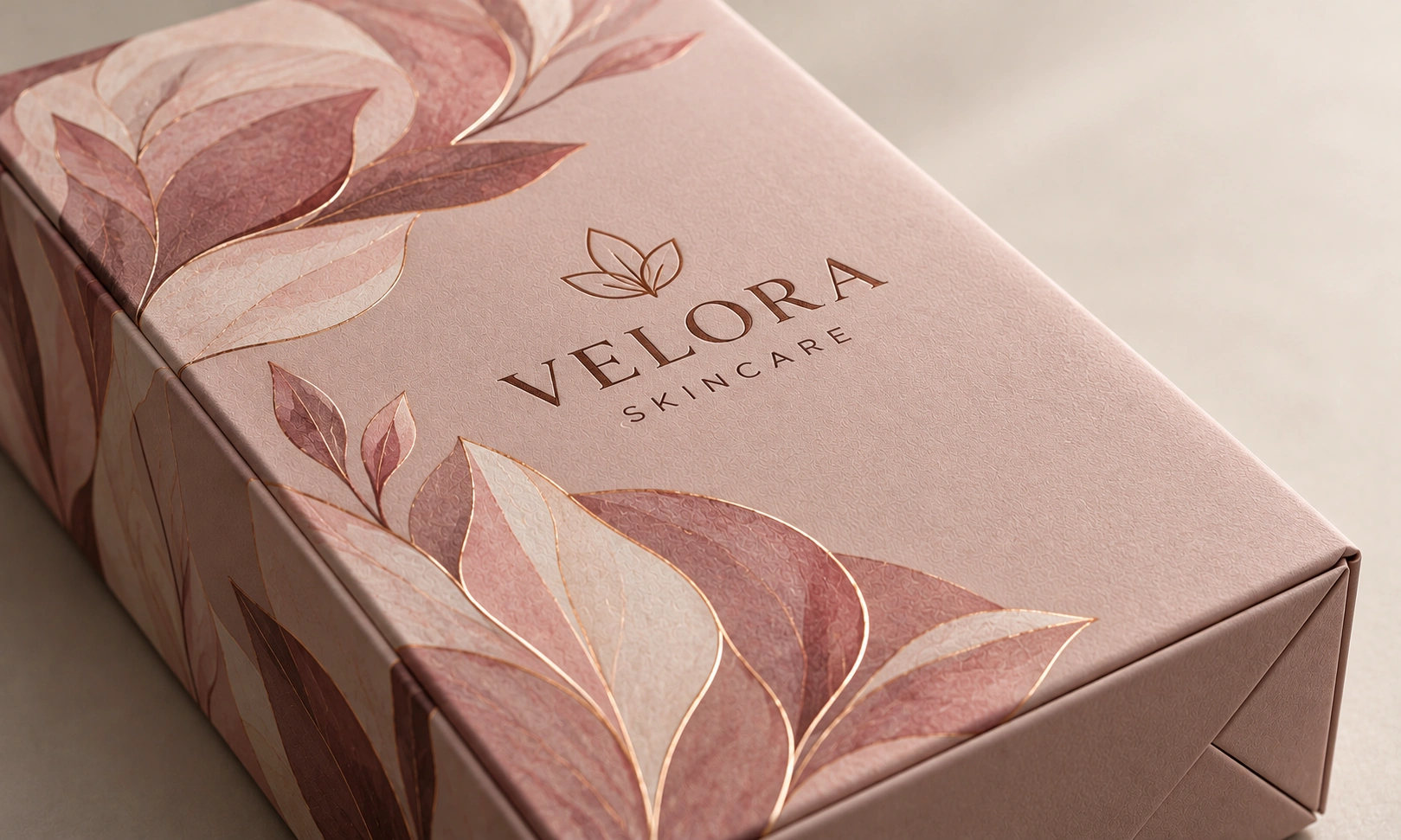 Velvety soft-touch lamination finish on Velora Skincare box packaging by Artsy Packaging UK