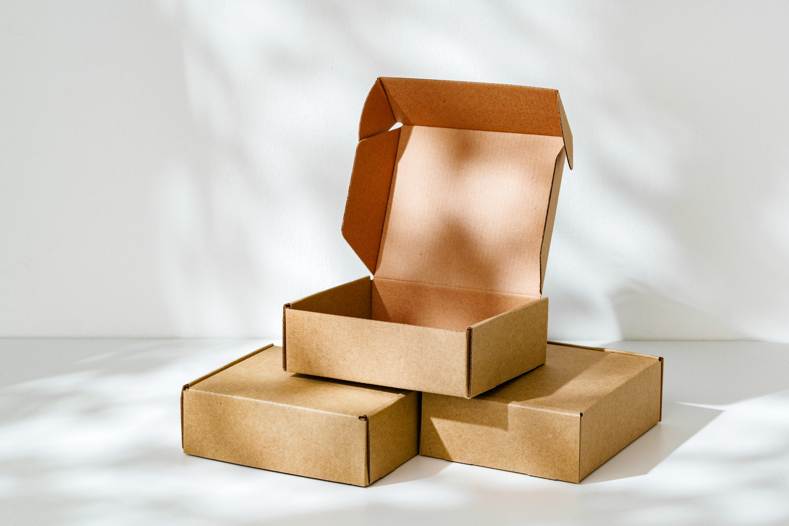 stacked cardboard boxes with open lid on top 2026 03 24 11 43 26 utc