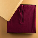 close up of red sweatshirt in packaging and copy s 2026 01 09 08 31 54 utc