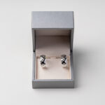 golden earrings and jewelry box on table close up 2026 01 08 05 30 14 utc