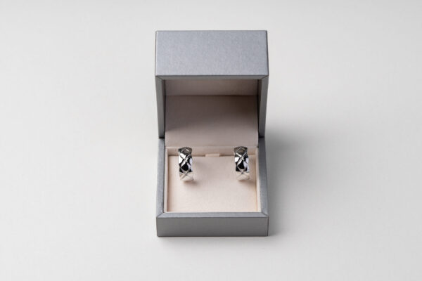 golden earrings and jewelry box on table close up 2026 01 08 05 30 14 utc
