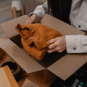 she is packing parcel to send to all customers th 2026 01 09 12 01 04 utc