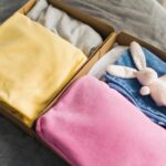 stack clothing for sorting and donation in cardboa 2026 01 06 09 17 12 utc