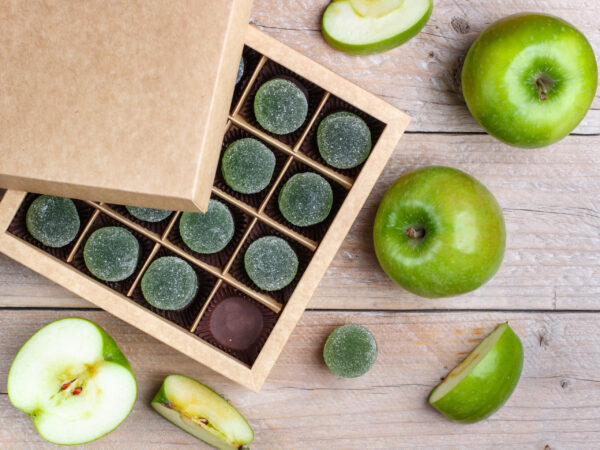 apple green marmalade candy in sugar in a paper cr 2026 01 11 08 05 13 utc