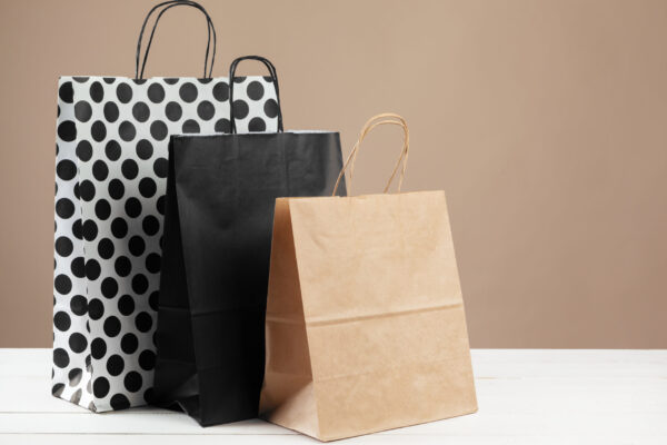 arrangement of shopping bags on beige background 2026 01 08 07 52 16 utc