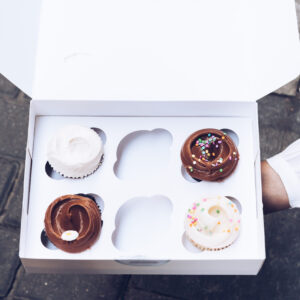 assorted gourmet tasty cupcakes on a carboard box 2026 01 08 22 00 00 utc