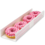 baked donuts with pink icing in white cardboard bo 2026 01 09 06 51 21 utc