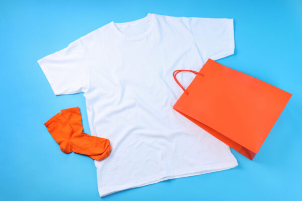 blank t shirt bag and socks on blue background 2026 01 09 07 04 09 utc