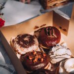 box of donuts in picnic set up 2026 01 05 05 19 32 utc