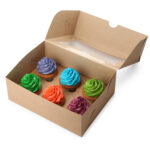 box with different cupcakes on white background 2025 12 31 00 05 58 utc