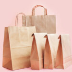 brown eco bags on pink background close up concep 2026 01 07 00 22 25 utc