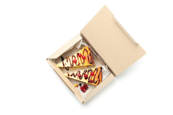 cheesecake in take away box isolated on white back 2026 01 09 07 24 18 utc