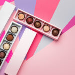 chocolate candies set pink box on a colored paper 2026 01 06 11 05 31 utc