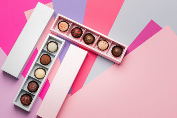chocolate candies set pink box on a colored paper 2026 01 06 11 05 31 utc