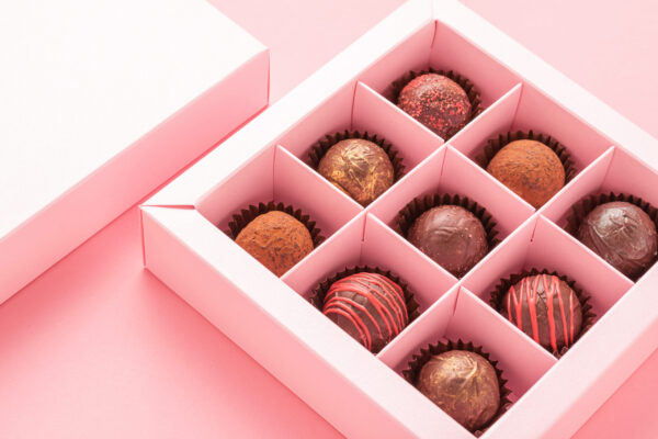 chocolate truffle candies box pink background gif 2026 01 06 10 55 02 utc