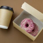 coffee paper cup and cardboard box with donuts to 2026 01 08 08 24 15 utc