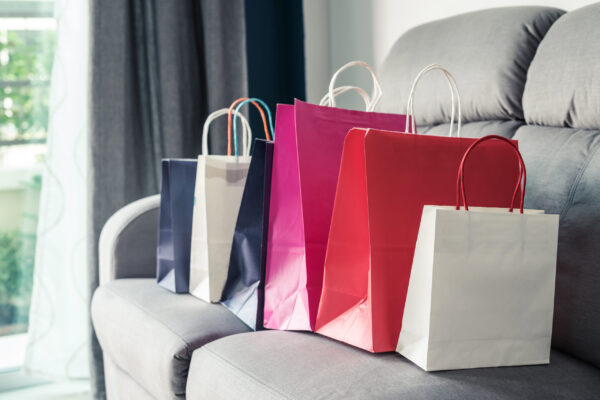 colorful shopping bags on sofa at home 2026 01 08 22 55 21 utc