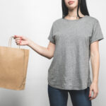 cropped shot of young woman in blank grey t shirt 2026 01 06 00 40 13 utc